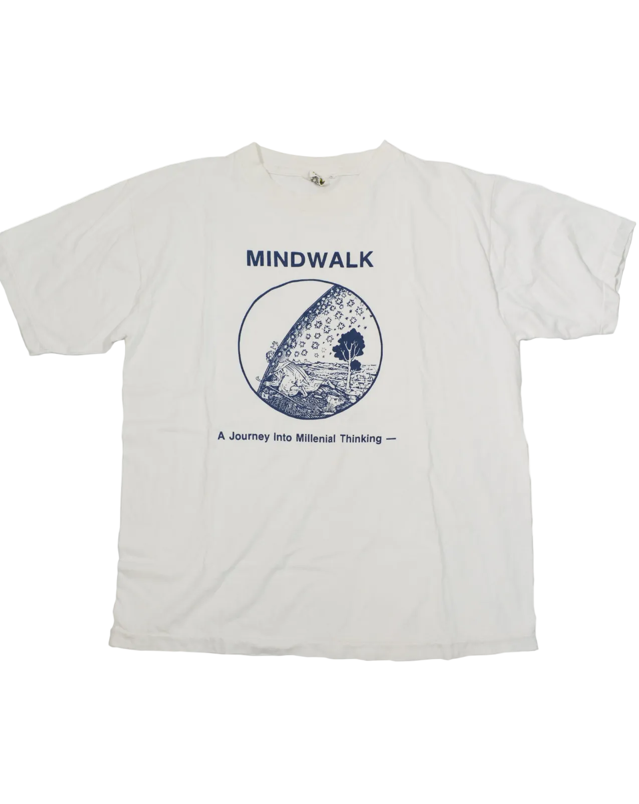 A white short-sleeve t-shirt with a blue graphic print on the front. The graphic features the text 'MINDWALK' above a circular illustration of a person shoving their head through a star covered surface with a tree and river in the background  and the subtitle 'A Journey Into Millenial Thinking'.
