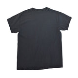 A plain black short-sleeve t-shirt shown from the back, laid flat against a solid white background.